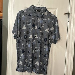 Travis Matthew golf short sleeve polo shirt. L.